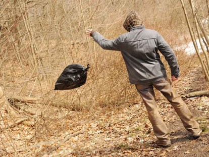 9-Man-throwing-garbage-bag-1024x769